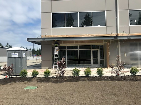 Commercial exterior painting in arlington wa prepping concrete and tilt up buildings for pnw weather